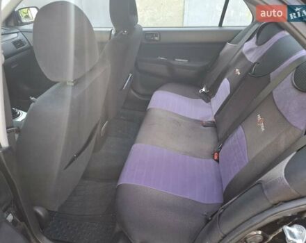 Мицубиси Лансер, объемом двигателя 1.6 л и пробегом 131 тыс. км за 6400 $, фото 12 на Automoto.ua