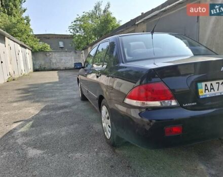 Мицубиси Лансер, объемом двигателя 1.6 л и пробегом 131 тыс. км за 6400 $, фото 4 на Automoto.ua