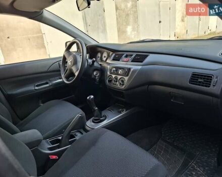 Мицубиси Лансер, объемом двигателя 1.6 л и пробегом 131 тыс. км за 6400 $, фото 15 на Automoto.ua