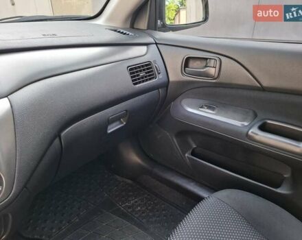 Мицубиси Лансер, объемом двигателя 1.6 л и пробегом 131 тыс. км за 6400 $, фото 10 на Automoto.ua