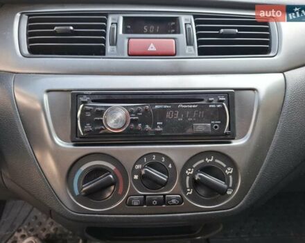 Мицубиси Лансер, объемом двигателя 1.6 л и пробегом 131 тыс. км за 6400 $, фото 11 на Automoto.ua