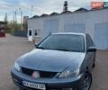 Мицубиси Лансер, объемом двигателя 1.6 л и пробегом 318 тыс. км за 3000 $, фото 1 на Automoto.ua