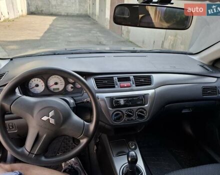 Мицубиси Лансер, объемом двигателя 1.6 л и пробегом 131 тыс. км за 6400 $, фото 7 на Automoto.ua