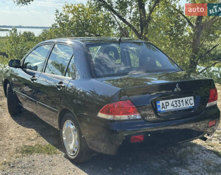 Мицубиси Лансер, объемом двигателя 1.6 л и пробегом 126 тыс. км за 6199 $, фото 6 на Automoto.ua