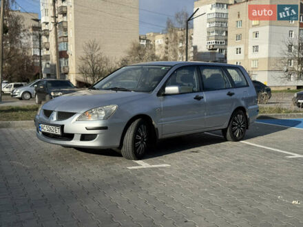Мицубиси Лансер, объемом двигателя 1.6 л и пробегом 210 тыс. км за 3800 $, фото 1 на Automoto.ua