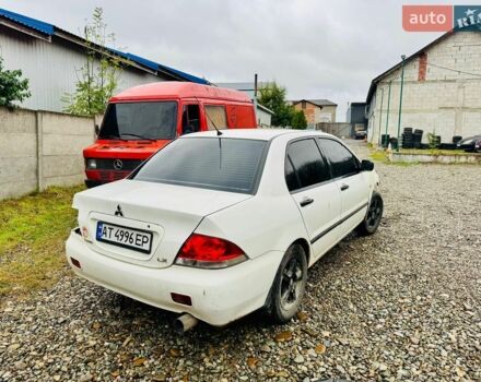 Мицубиси Лансер, объемом двигателя 1.58 л и пробегом 204 тыс. км за 999 $, фото 1 на Automoto.ua