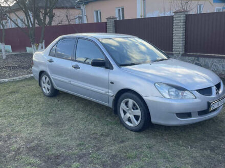 Мицубиси Лансер, объемом двигателя 1.58 л и пробегом 238 тыс. км за 4250 $, фото 1 на Automoto.ua