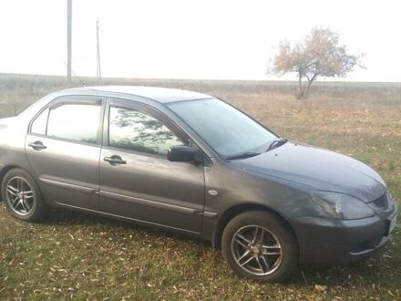 Міцубісі Lancer, об'ємом двигуна 1.6 л та пробігом 230 тис. км за 4200 $, фото 1 на Automoto.ua