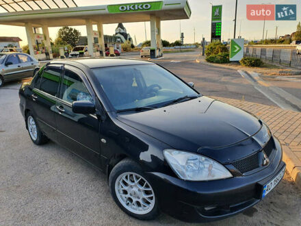 Мицубиси Лансер 2006 в Ужгороде на Automoto.ua Мицубиси Лансер, объемом двигателя 1.6 л и пробегом 320 тыс. км за 3200 $, фото 1 на Automoto.ua