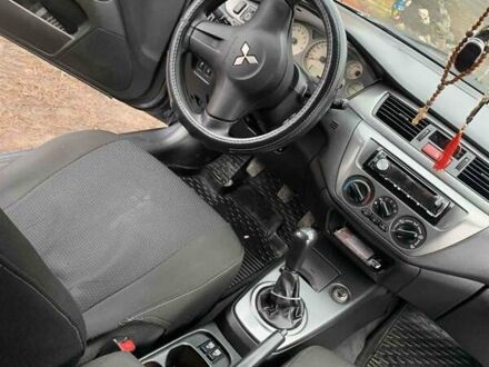 Мицубиси Лансер 2006 в Карловке на Automoto.ua Мицубиси Лансер, объемом двигателя 1.58 л и пробегом 245 тыс. км за 5300 $, фото 1 на Automoto.ua