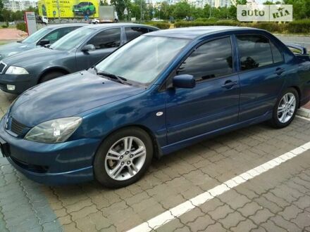 Міцубісі Lancer 2006 у Києві на Automoto.ua Міцубісі Lancer, об'ємом двигуна 2 л та пробігом 143 тис. км за 4800 $, фото 1 на Automoto.ua