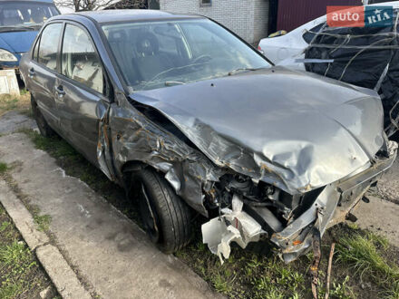 Мицубиси Лансер, объемом двигателя 1.6 л и пробегом 200 тыс. км за 999 $, фото 1 на Automoto.ua