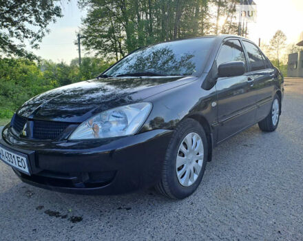 Міцубісі Lancer, об'ємом двигуна 1.6 л та пробігом 204 тис. км за 6199 $, фото 1 на Automoto.ua