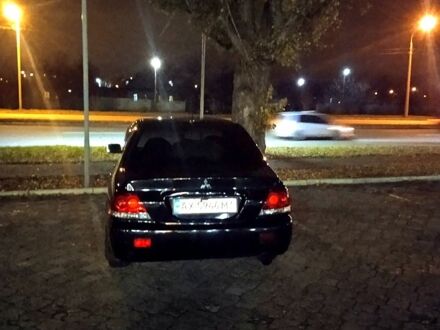 Мицубиси Лансер, объемом двигателя 1.6 л и пробегом 200 тыс. км за 3999 $, фото 1 на Automoto.ua