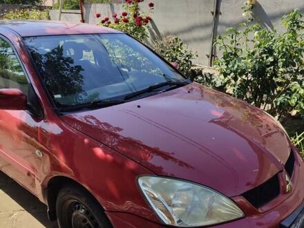 Мицубиси Лансер, объемом двигателя 1.6 л и пробегом 140 тыс. км за 3600 $, фото 1 на Automoto.ua