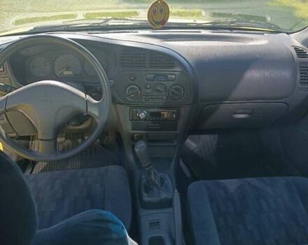 Жовтий Міцубісі Lancer, об'ємом двигуна 1.3 л та пробігом 306 тис. км за 1500 $, фото 8 на Automoto.ua