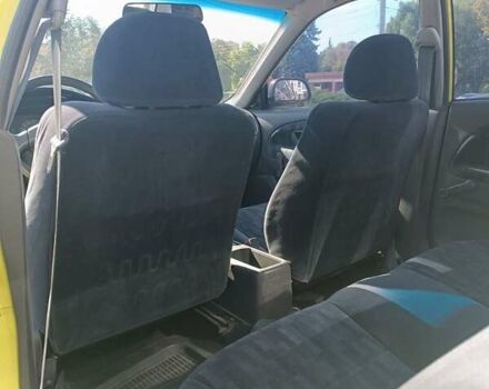 Жовтий Міцубісі Lancer, об'ємом двигуна 1.3 л та пробігом 306 тис. км за 1500 $, фото 9 на Automoto.ua