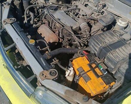 Жовтий Міцубісі Lancer, об'ємом двигуна 1.3 л та пробігом 306 тис. км за 1500 $, фото 13 на Automoto.ua