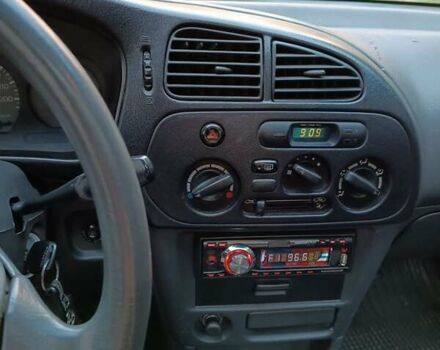 Жовтий Міцубісі Lancer, об'ємом двигуна 1.3 л та пробігом 306 тис. км за 1500 $, фото 10 на Automoto.ua