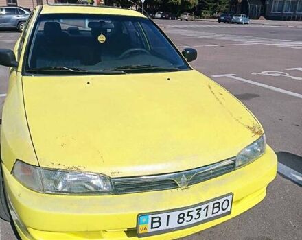 Жовтий Міцубісі Lancer, об'ємом двигуна 1.3 л та пробігом 306 тис. км за 1500 $, фото 1 на Automoto.ua