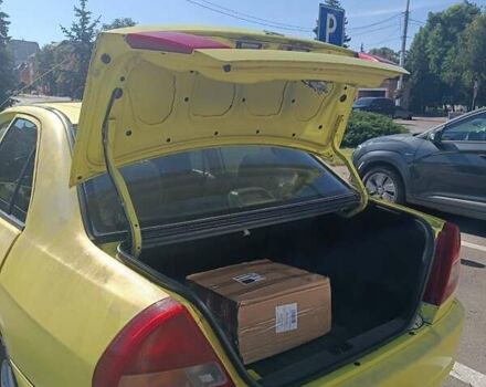 Жовтий Міцубісі Lancer, об'ємом двигуна 1.3 л та пробігом 306 тис. км за 1500 $, фото 7 на Automoto.ua
