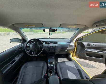 Мицубиси Лансер 2002 в Ивано-Франковске на Automoto.ua Желтый Мицубиси Лансер, объемом двигателя 2 л и пробегом 262 тыс. км за 3999 $, фото 8 на Automoto.ua