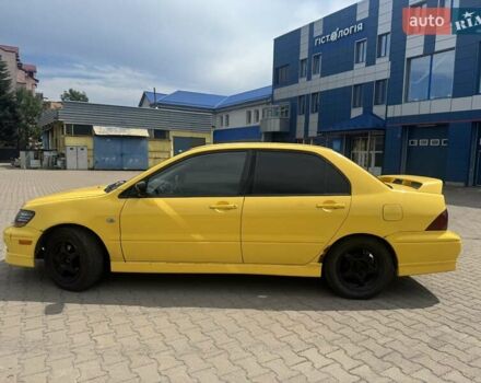 Мицубиси Лансер 2002 в Ивано-Франковске на Automoto.ua Желтый Мицубиси Лансер, объемом двигателя 2 л и пробегом 262 тыс. км за 3999 $, фото 5 на Automoto.ua