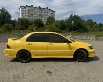 Жовтий Міцубісі Lancer, об'ємом двигуна 2 л та пробігом 262 тис. км за 3300 $, фото 3 на Automoto.ua