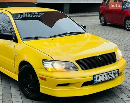 Желтый Мицубиси Лансер, объемом двигателя 2 л и пробегом 263 тыс. км за 4500 $, фото 1 на Automoto.ua