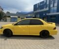 Жовтий Міцубісі Lancer, об'ємом двигуна 2 л та пробігом 262 тис. км за 3300 $, фото 1 на Automoto.ua