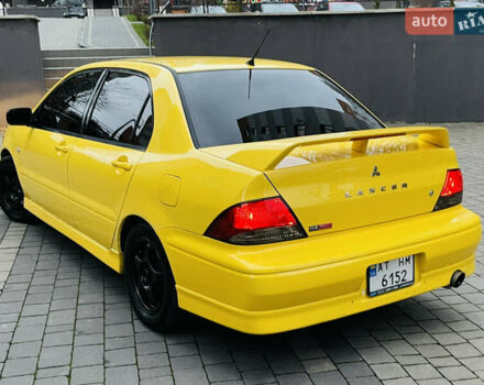 Желтый Мицубиси Лансер, объемом двигателя 2 л и пробегом 263 тыс. км за 4500 $, фото 17 на Automoto.ua