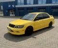 Мицубиси Лансер 2002 в Ивано-Франковске на Automoto.ua Желтый Мицубиси Лансер, объемом двигателя 2 л и пробегом 262 тыс. км за 3999 $, фото 4 на Automoto.ua
