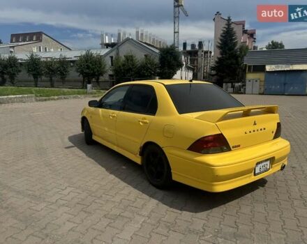 Мицубиси Лансер 2002 в Ивано-Франковске на Automoto.ua Желтый Мицубиси Лансер, объемом двигателя 2 л и пробегом 262 тыс. км за 3999 $, фото 6 на Automoto.ua