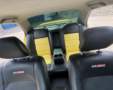 Жовтий Міцубісі Lancer, об'ємом двигуна 2 л та пробігом 262 тис. км за 3300 $, фото 7 на Automoto.ua