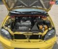 Мицубиси Лансер 2002 в Ивано-Франковске на Automoto.ua Желтый Мицубиси Лансер, объемом двигателя 2 л и пробегом 262 тыс. км за 3999 $, фото 11 на Automoto.ua