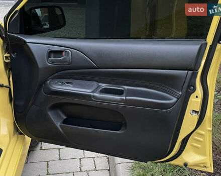 Желтый Мицубиси Лансер, объемом двигателя 2 л и пробегом 263 тыс. км за 4500 $, фото 23 на Automoto.ua