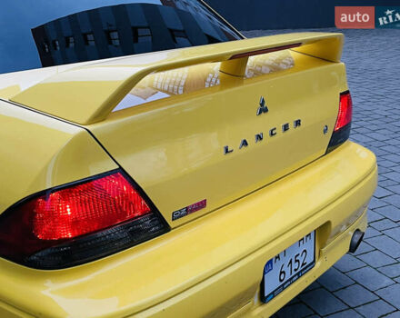 Желтый Мицубиси Лансер, объемом двигателя 2 л и пробегом 263 тыс. км за 4500 $, фото 16 на Automoto.ua