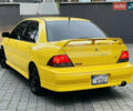 Желтый Мицубиси Лансер, объемом двигателя 2 л и пробегом 263 тыс. км за 4500 $, фото 26 на Automoto.ua