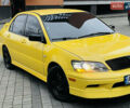 Желтый Мицубиси Лансер, объемом двигателя 2 л и пробегом 263 тыс. км за 4500 $, фото 14 на Automoto.ua