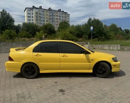 Мицубиси Лансер 2002 в Ивано-Франковске на Automoto.ua Желтый Мицубиси Лансер, объемом двигателя 2 л и пробегом 262 тыс. км за 3999 $, фото 1 на Automoto.ua