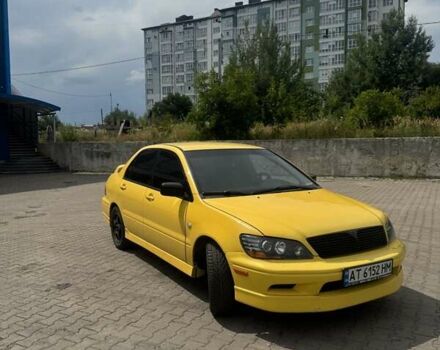 Мицубиси Лансер 2002 в Ивано-Франковске на Automoto.ua Желтый Мицубиси Лансер, объемом двигателя 2 л и пробегом 262 тыс. км за 3999 $, фото 2 на Automoto.ua