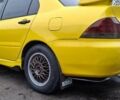 Желтый Мицубиси Лансер, объемом двигателя 1.3 л и пробегом 380 тыс. км за 3500 $, фото 16 на Automoto.ua