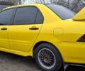 Желтый Мицубиси Лансер, объемом двигателя 1.3 л и пробегом 380 тыс. км за 3500 $, фото 17 на Automoto.ua