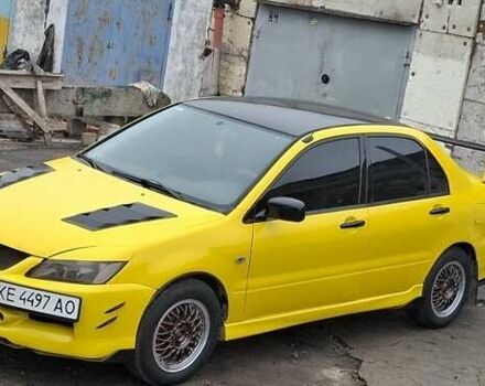 Желтый Мицубиси Лансер, объемом двигателя 1.3 л и пробегом 380 тыс. км за 3500 $, фото 11 на Automoto.ua