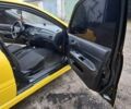 Желтый Мицубиси Лансер, объемом двигателя 1.3 л и пробегом 380 тыс. км за 3500 $, фото 5 на Automoto.ua