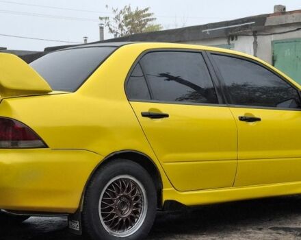 Жовтий Міцубісі Lancer, об'ємом двигуна 1.3 л та пробігом 380 тис. км за 3500 $, фото 21 на Automoto.ua