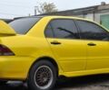 Жовтий Міцубісі Lancer, об'ємом двигуна 1.3 л та пробігом 380 тис. км за 3500 $, фото 21 на Automoto.ua