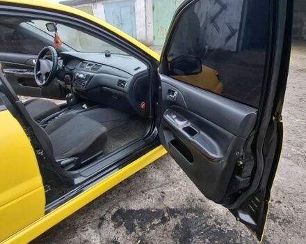 Жовтий Міцубісі Lancer, об'ємом двигуна 1.3 л та пробігом 380 тис. км за 3500 $, фото 6 на Automoto.ua