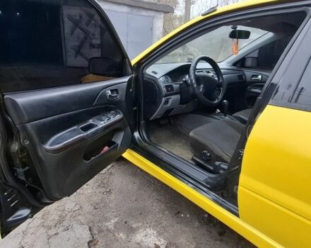 Жовтий Міцубісі Lancer, об'ємом двигуна 1.3 л та пробігом 380 тис. км за 3500 $, фото 11 на Automoto.ua