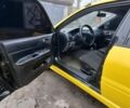 Жовтий Міцубісі Lancer, об'ємом двигуна 1.3 л та пробігом 380 тис. км за 3500 $, фото 11 на Automoto.ua
